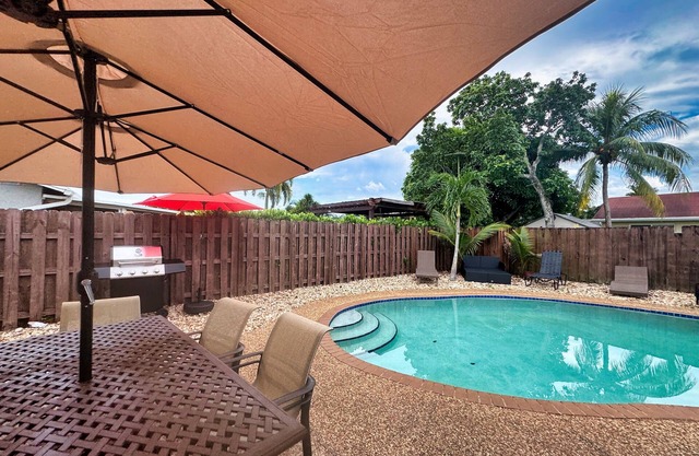 "Escape to paradise: Relax at Splendid Scapes with pool and game room"