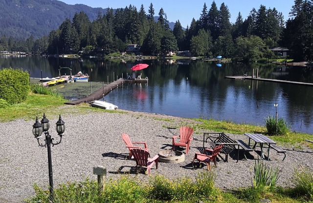 Experience lake life! Beachfront 3BR, steps from a private beach.