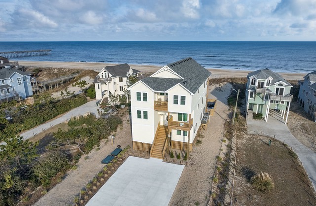 Experience luxury at 1 Perfect Vacation, a spacious oceanfront retreat in South Nags Head
