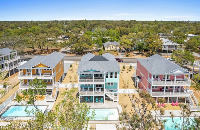 Experience luxury, Custom Home, spacious 6-bedroom, 6.5-bathroom, heated pool, easy beach access