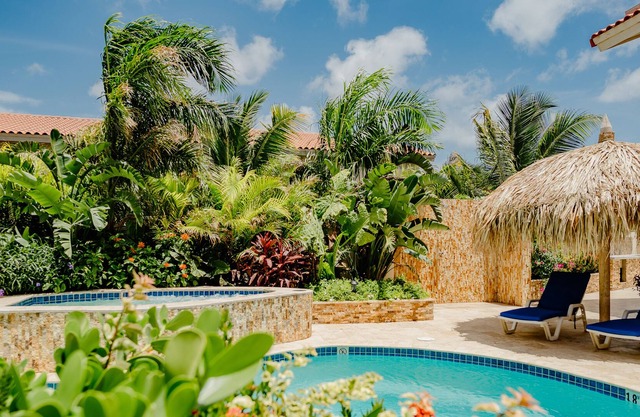 Fabulous modern 2-bedroom apartment with tropical garden, pool and whirlpool