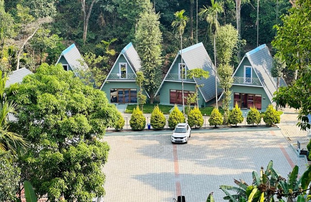 Falling Water Resort by Travent Mug