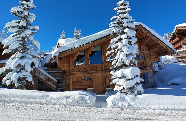 Family Chalet with Spa in Courchevel 1850 – Ski-In/Ski-Out, Fireplace, Concierge Services