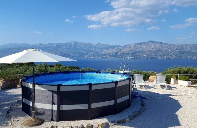 Family friendly house with a swimming pool Postira, Brač (K-11742)