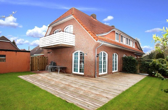 Ferienhaus in Dornum mit Garten