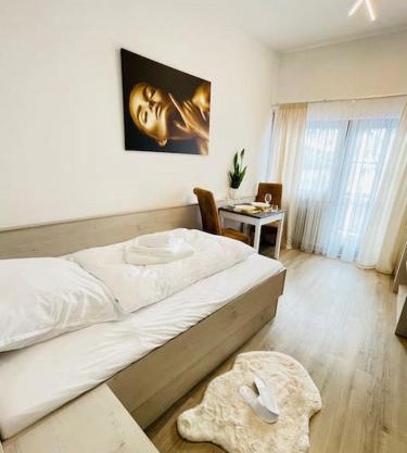 FeWo 20 - Appartement im Rottalblick - YoungModern wohnen, Tiere willkommen, Bademantelgang zur Therme, TV und Balkon