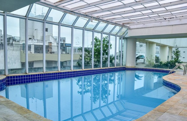 Flat com piscina e lazer na Praia de Pitangueiras