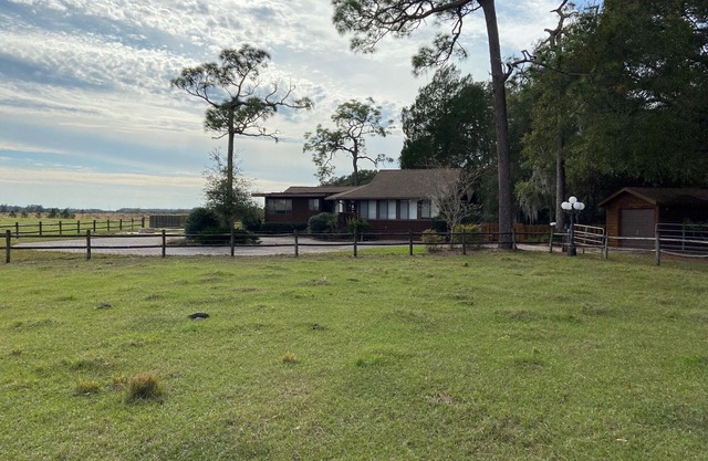 Former Hunting Lodge on 24 Acres with Lake with heated pool