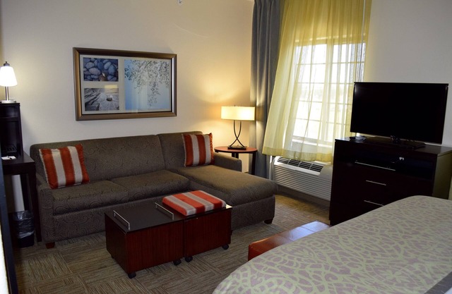 Free Breakfast + Outdoor Pool + 24 Hour Fitness Center and Business Center