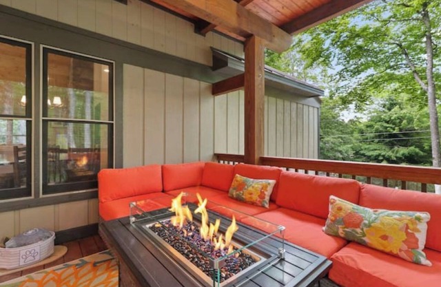 French Flair Designed Custom Cabin with covered porch and gas firepit