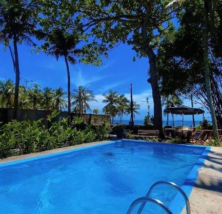 Frente ao Mar - Suites com Piscina Aquecida, SPA Privativo, Vista ao Mar ou Montanha, com Estacionamento- Raizes do Mar ECO Hotel