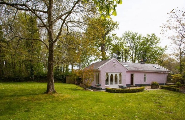 Gate lodge pink quaint lodge