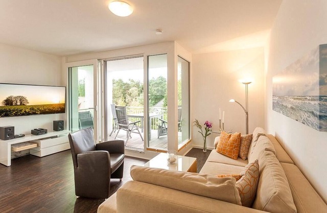 Geschmackvolles Ostseeapartment mit Großem Balkon, Whirlbadewanne und Kaminofen