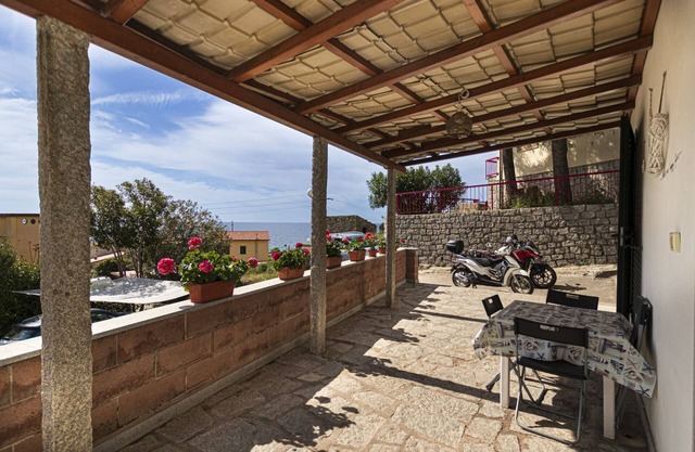 Ginevra Apartment in Seccheto, with equipped porch with splendid sea view, close to the center and t
