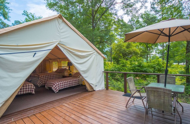 Glamping tents overlooking a 70 acre lake
