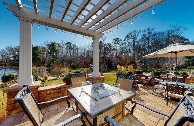 Gorgeous Bay Forest home with resort amenities, raised patio, office, & firepits