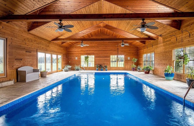 Gorgeous Home featuring an Indoor Heated Pool, Gourmet Kitchen & Outdoor Spaces