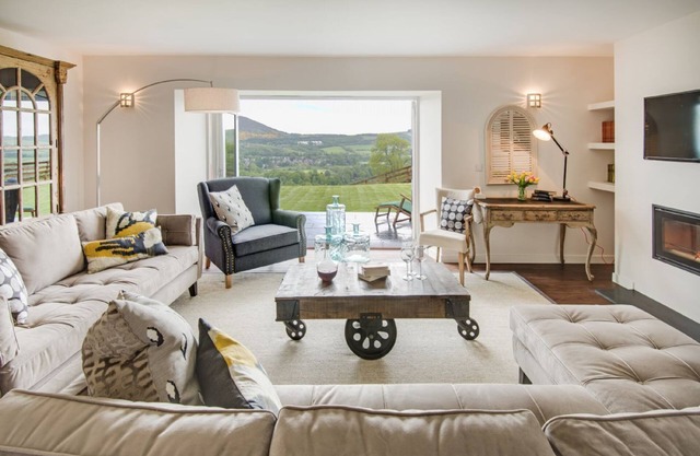 GRANARY, sleeps 8, superb barn conversion. Outstanding views, near to Melrose