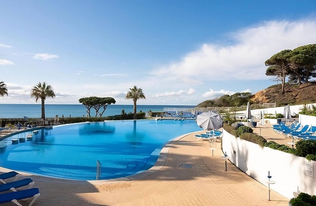 Group Getaway in Oura Beach! Four Sea View Units, Swimming Pools, Beachfront!