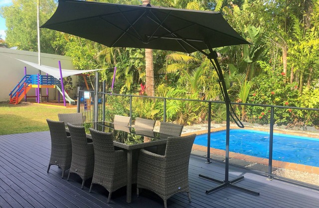 Heated Pool surrounded by Tropical Private Open Space at Trinity