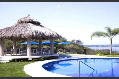 Hermoso departamento en Tequesquitengo vista acceso al lago alberca climatizada