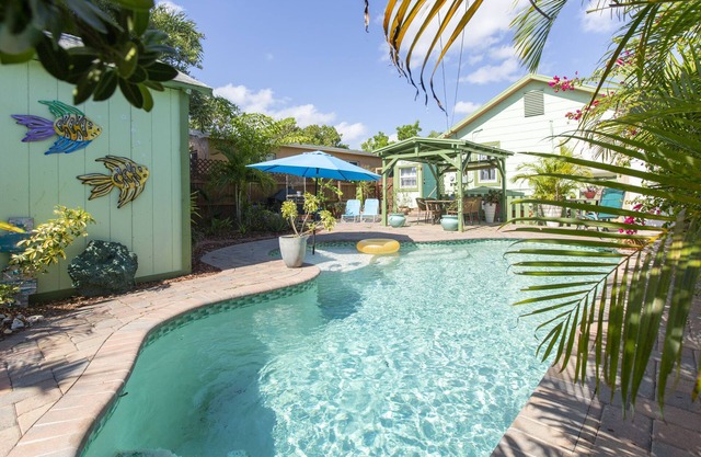 Hidden Private Tropical Oasis with Two Cottages, Pool and Gorgeous Gardens
