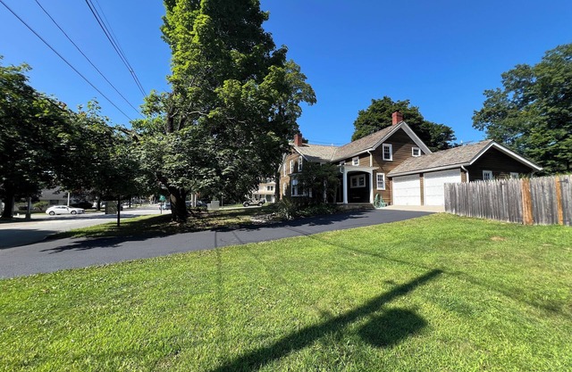 Historic 5-bedroom house with beautiful back yard suitable for private events.
