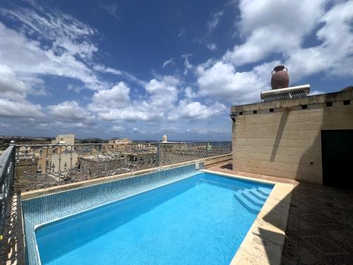 Historic Farmhouse close to San Blass Beach with Courtyard, Kitchen Terrace and Rooftop Pool