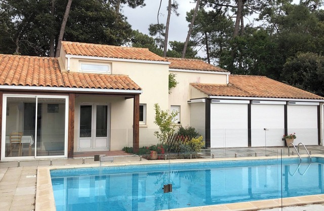 Holiday Home with Shared Pool, Private Terrace and Shared Garden