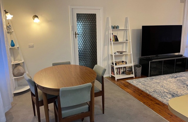 Home close to entertainment, food, sporting venues with parking.