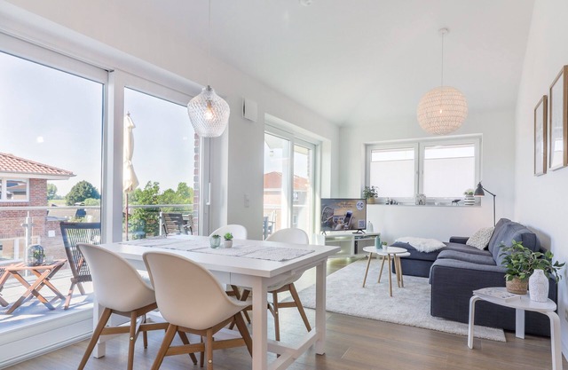 Hookser Perle: Modern hygge penthouse directly behind the dyke