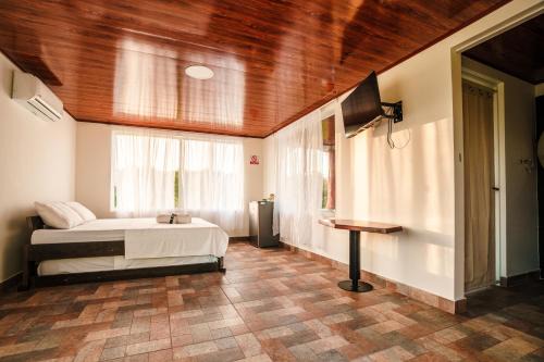 Hospedaje El Kinkajú Lodge