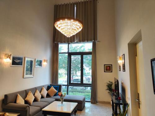 Hostie Evanya - 2BHK Serviced Apartment near Golf Course Road