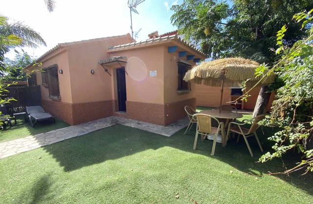 House/bungalow in tourist complex with private garden and shared pool