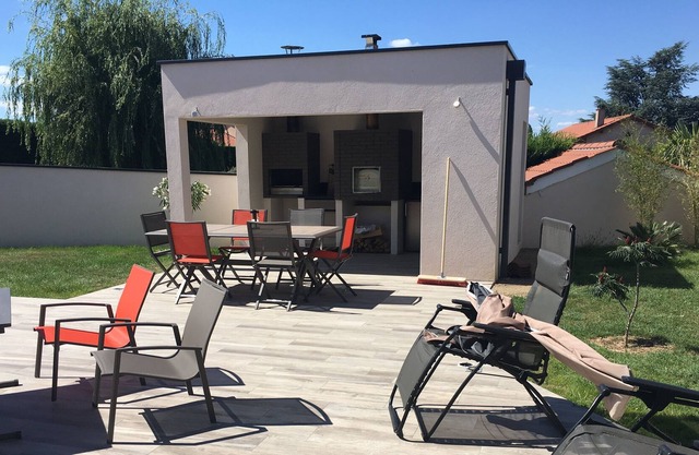 House with heated pool and summer kitchen