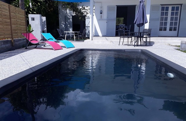 House with pool and open view