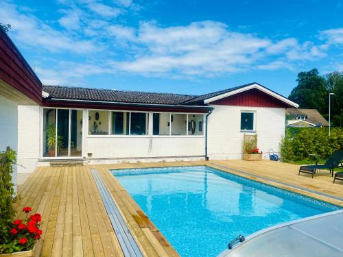 Hus med uppvärmd pool