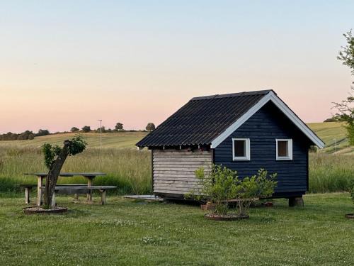 Hyggelig hytte i landlig idyl