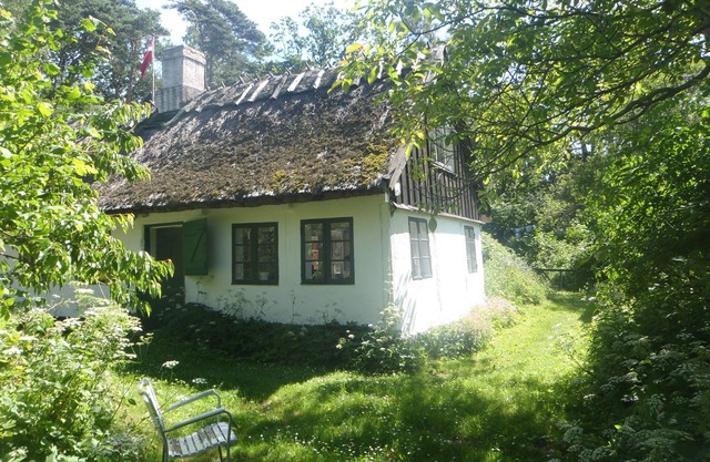Idyllic old farmhouse in a protected scenic area near the forest and beach.