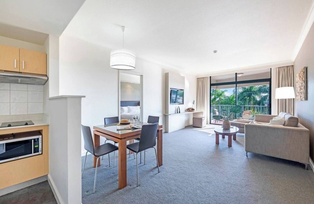 Idyllic Waterfront Pool Escape with Esplanade View