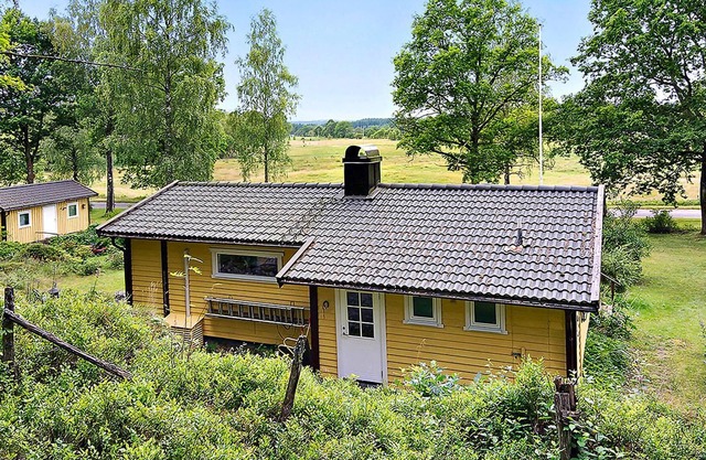 Idyllically located wooden house on the edge of the forest.