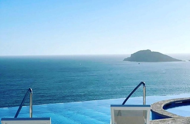 in front of the beach and boardwalk, and the best view of the sunset