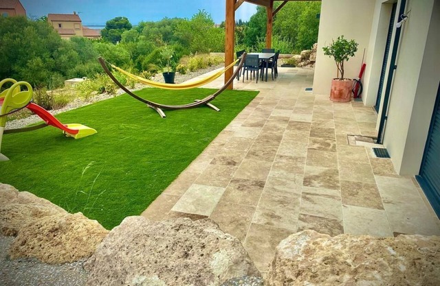 In Leucate village, accommodation 100 m2 sea view in garrigue.