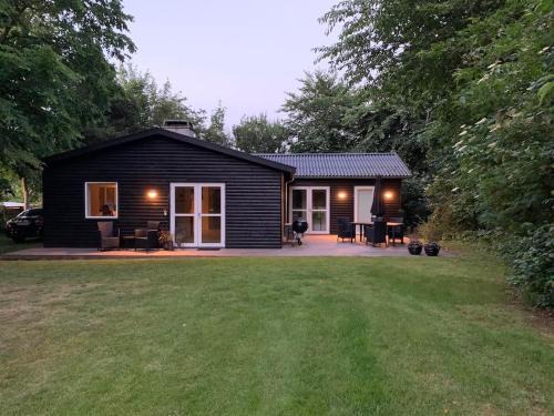 In The Charming Coastal Town Of Rågeleje, This Lovely Holiday Home Is Located