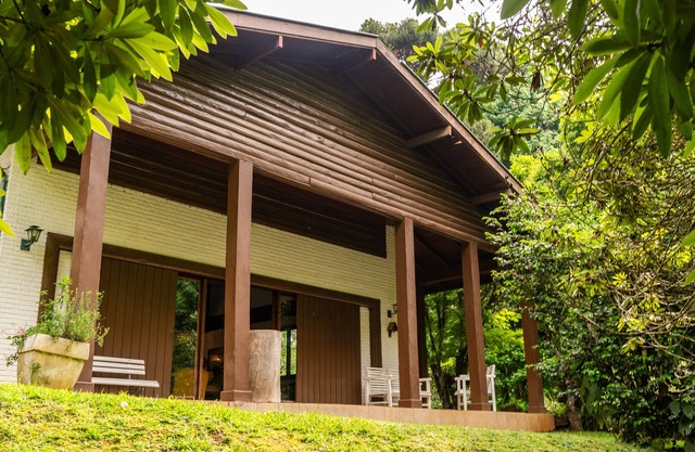 Incredible house with waterfall in the middle of nature
