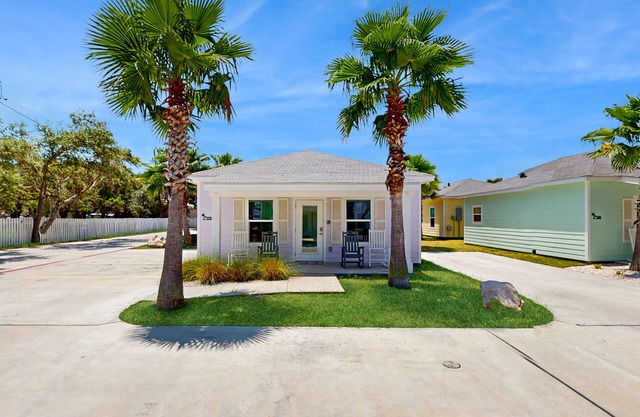Inviting coastal home with shared pool and stocked pond - steps to the beach