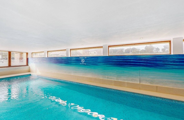 Inviting cottage with indoor community pool and activity room.