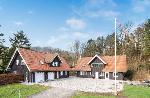 Inviting vacation home with wood stove and grounds, located in a cozy town outside Arhus.