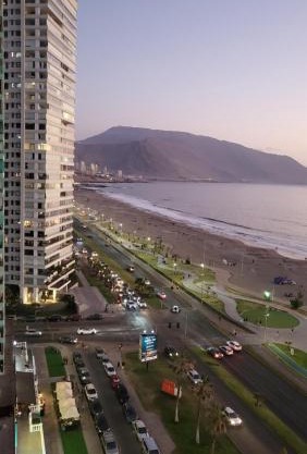 Iquique - Departamento ubicado frente a la Playa - Incluye Estacionamiento, Puesta de Sol y Mar - Reserva mínima 2 Noches