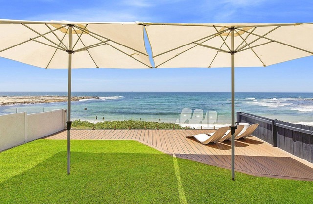 JOEANNE -ABSOLUTE BEACHFRONT AT BLUE BAY